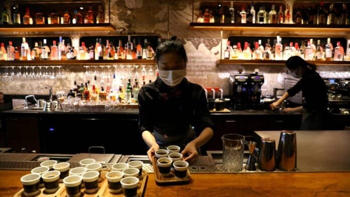 Starbucks posts first global sales growth in 18 months, high coffee prices erode profits