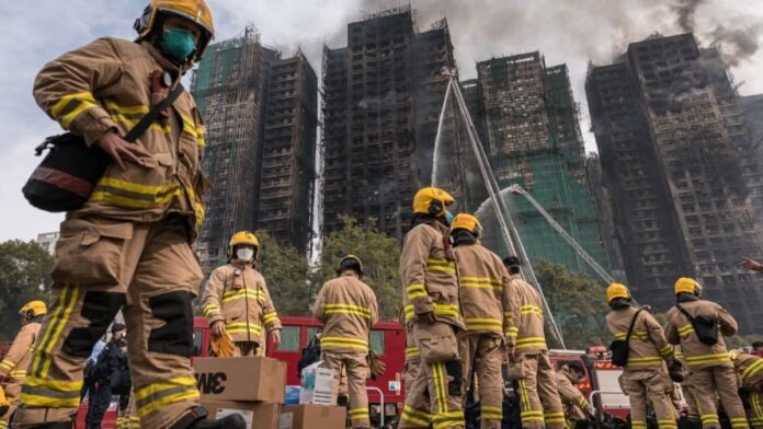 Hong Kong fire: Rescue teams race to find survivors in still-burning towers as death toll rises to 83