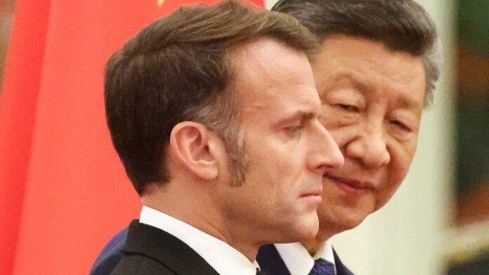Macron says France and China 'must overcome differences' as he meets Xi in Beijing