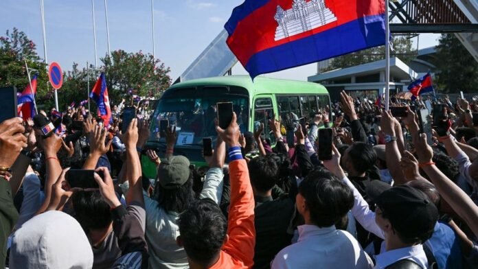 Prisoners go home: Thailand frees 18 Cambodian soldiers captured in July as ceasefire sticks